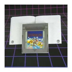 Oferta de Novelmex Libreta Cartucho De Game Boy PP3932NNTX por $249 en Juguetrón